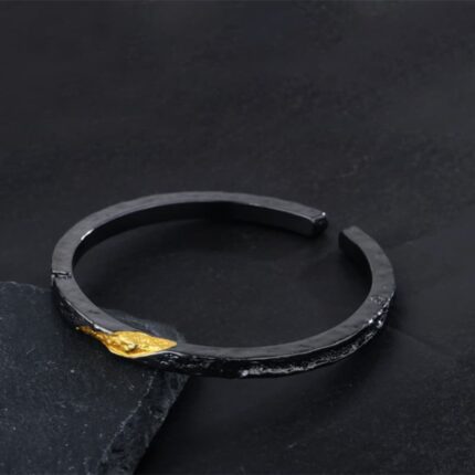 Gold textured black flowing fire bracelet